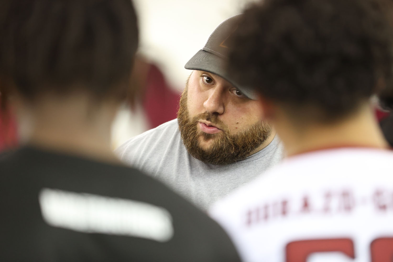Coach Ashak talking to his team