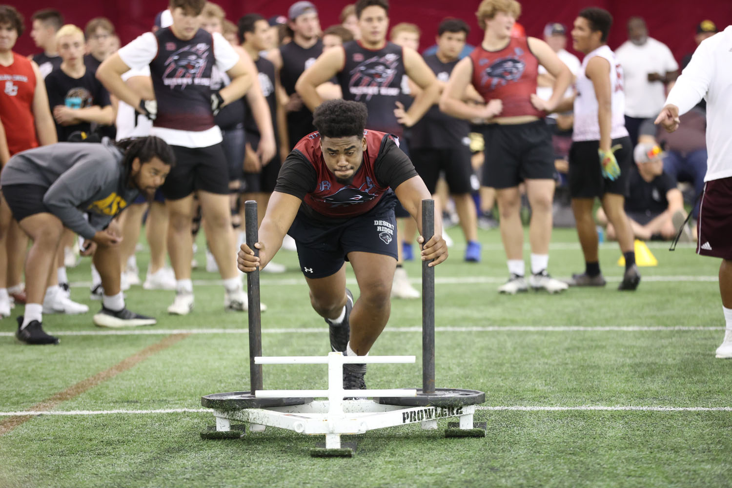 Greg pushing the sled in the big man challenge