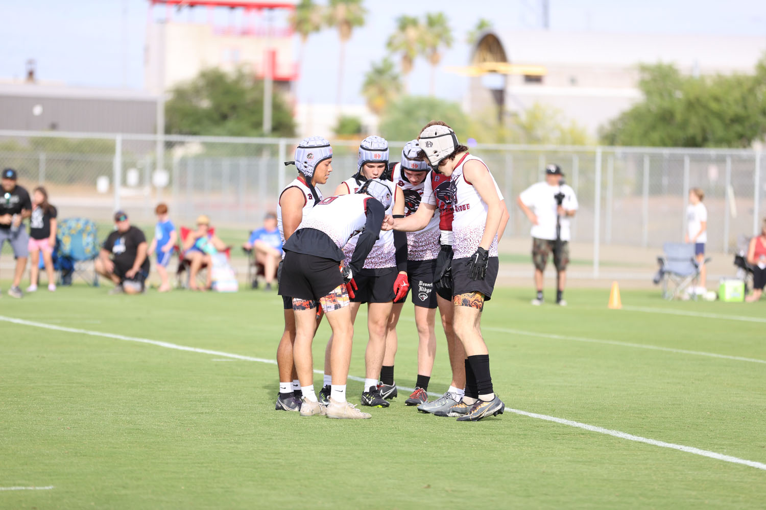 DRHS Offense in the huddle