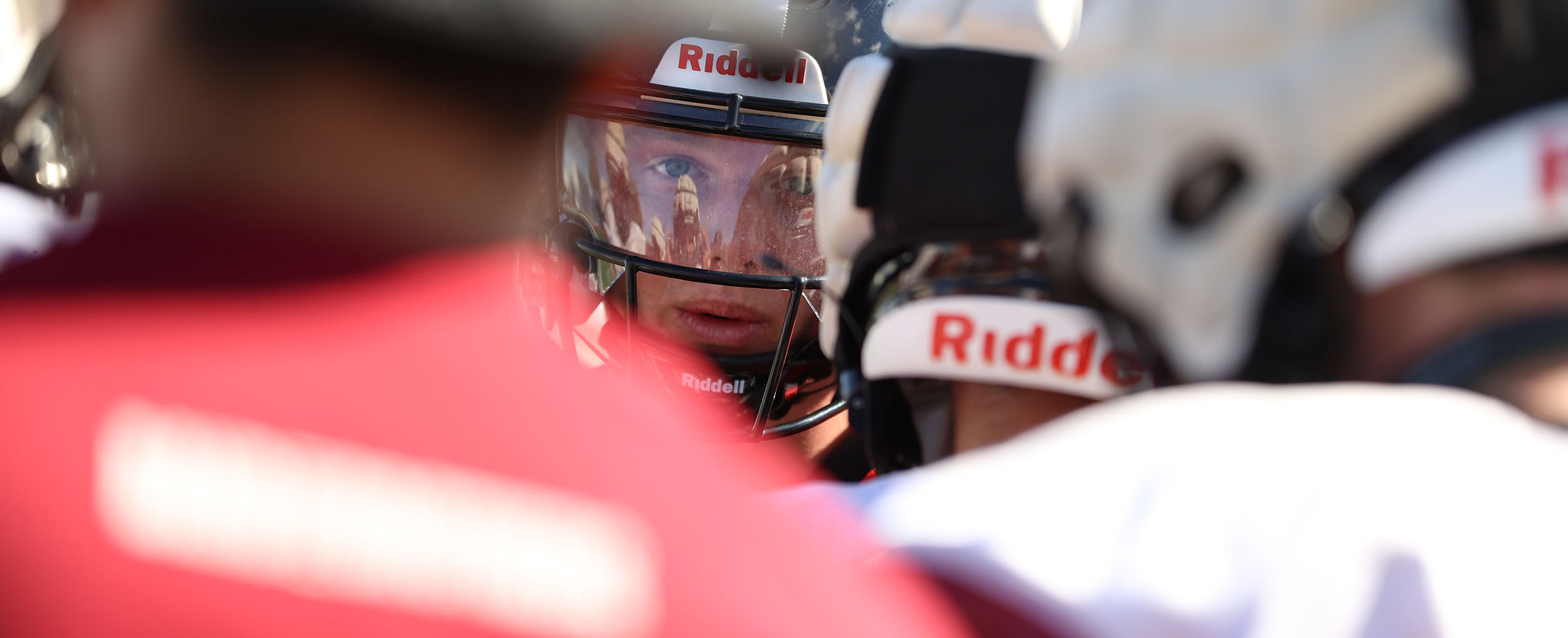 DRHS Offense in the huddle