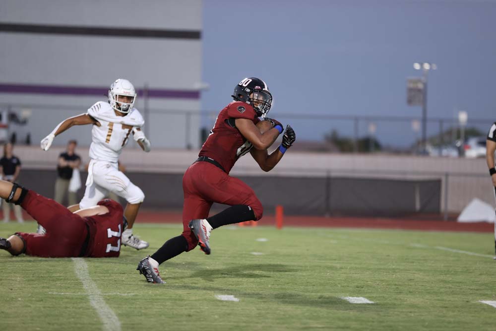 Isiah scoring a touchdown