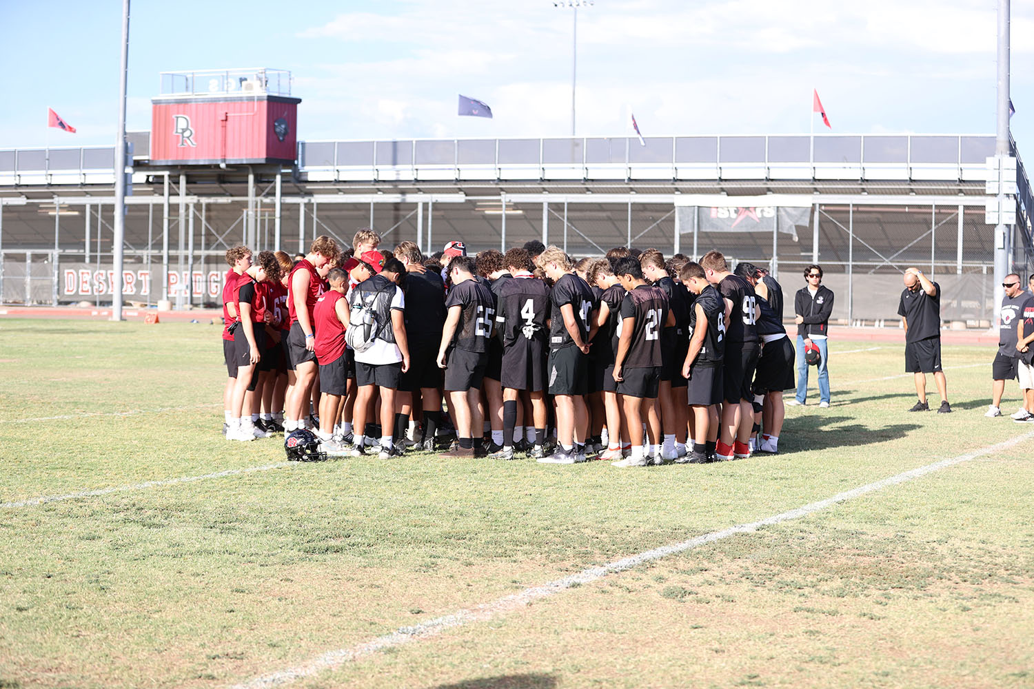 Team huddles before the game