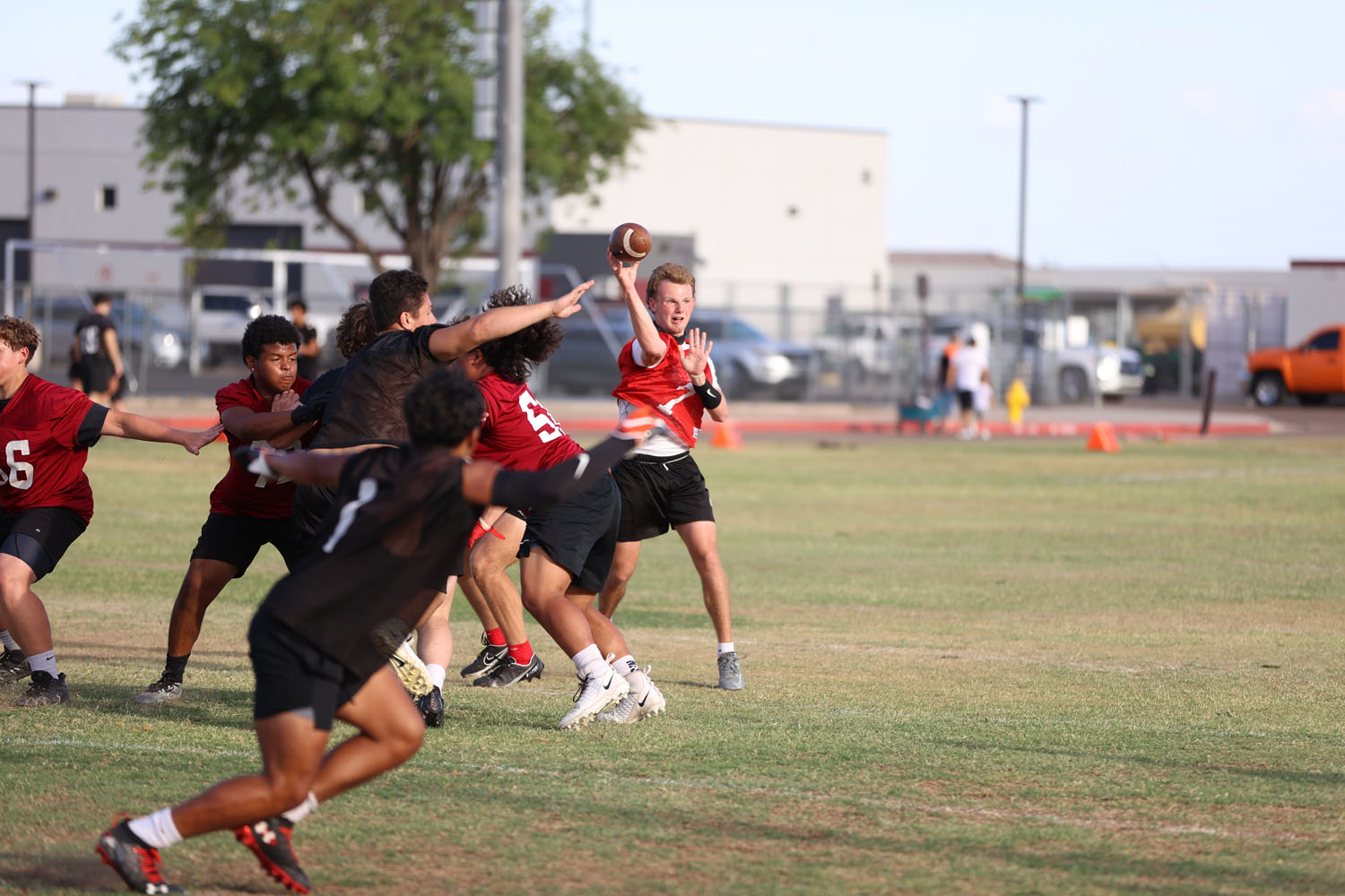 The Quarterback throwing the ball