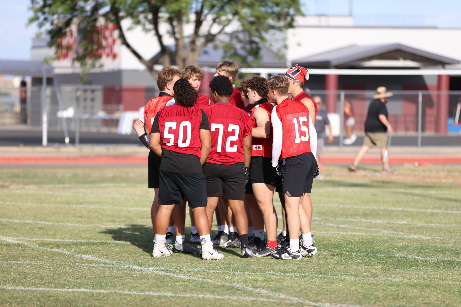 Red Team in their huddle