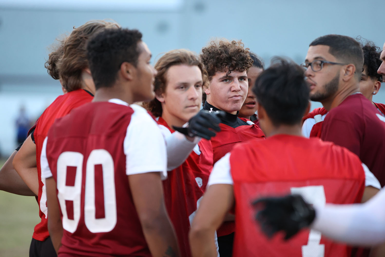 Red Team getting instructions from coach